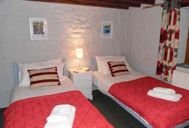 Twin Beds at Primrose Cottage in North Petherwin, Cornwall